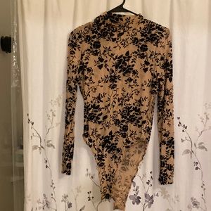 Womens floral print shear body suit size medium